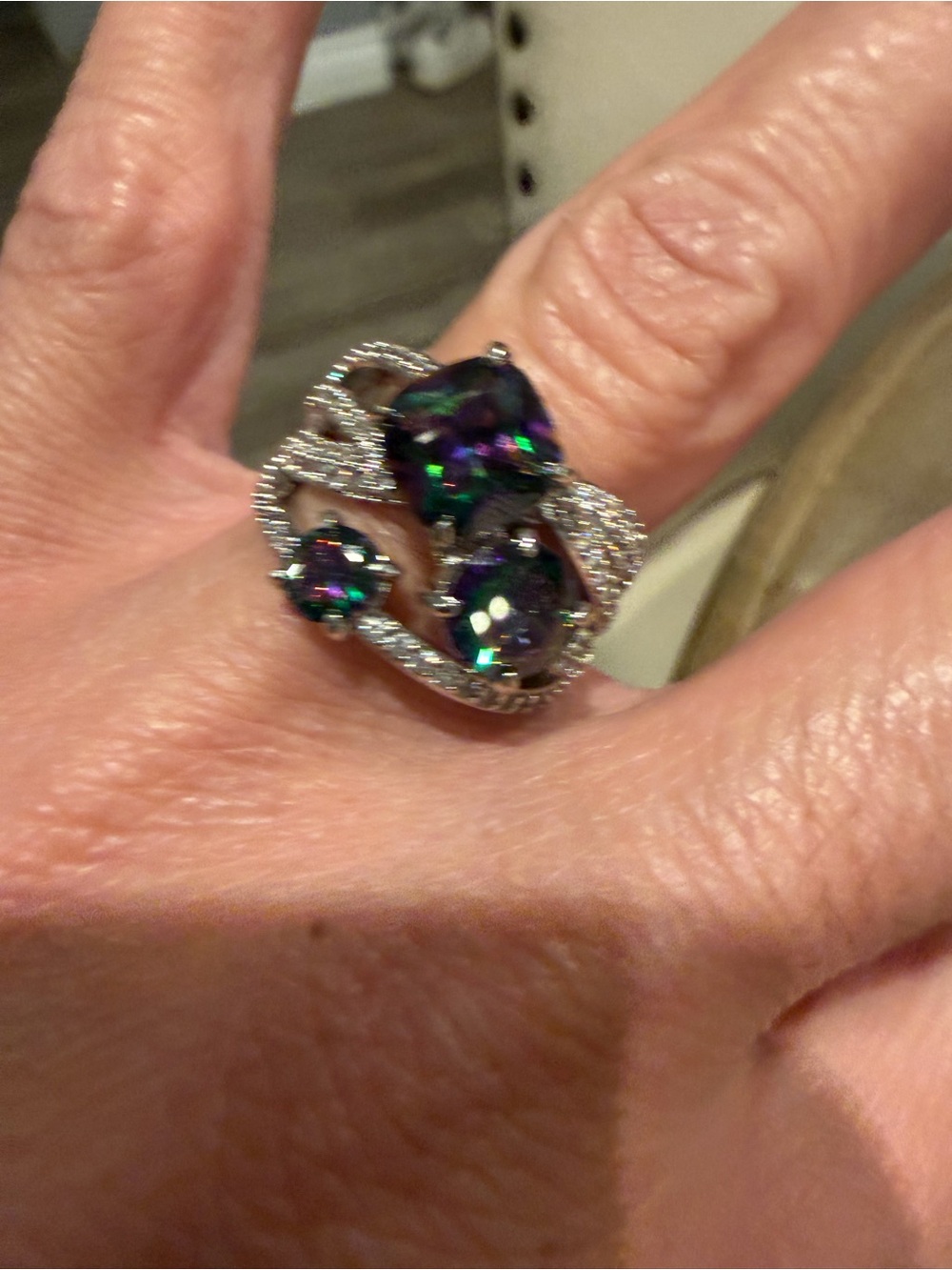 Silver-Tone Ring with Iridescent Green-Blue Gemstones